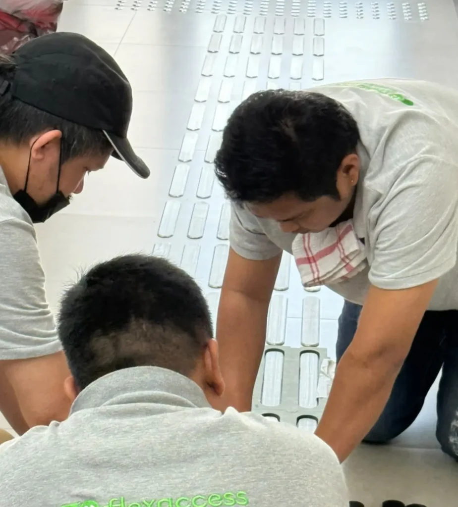 Flex Access Team is installing taclines in AG Cars vehicle testing center